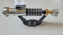 metal lightsaber stand