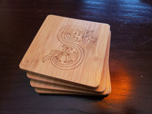 set of 4 society of explorers and adventurers themed bamboo coasters