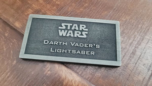 Darth Vader's lightsaber name plate