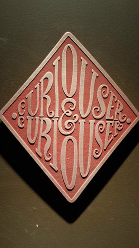 Alice in Wonderland themed wall plaque curiouser and curiouser